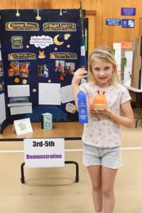 Third Grader Peyton Nichols earned a first place ribbon for her 3rd-5th demonstration creation of an Orange Bunny Night Light. Dave Torres photo.